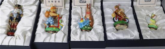 Three Halcyon Days enamel bonbonierres modelled as rabbits & two others